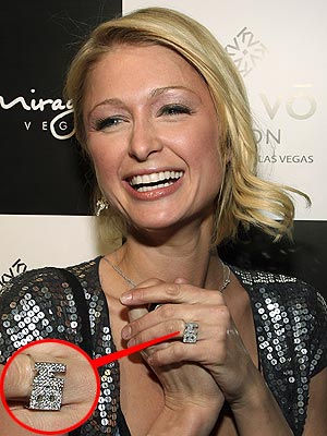 Paris Hilton is going around town sporting a ring with BM in big diamonds