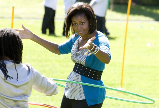 1-u-s-first-lady-michelle-obama-hula-hoops-at-healthy-kids-fair-on-south-lawn-of-the-white-house-in-washington