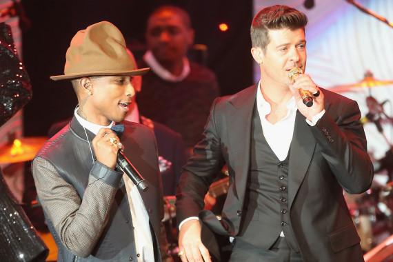 Pharrell Williams and Robin Thicke perform together